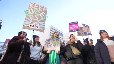 Nurses and ambulance service workers strike Stock Footage 232396813