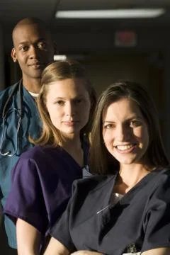Nurses and doctor posing Stock Photos