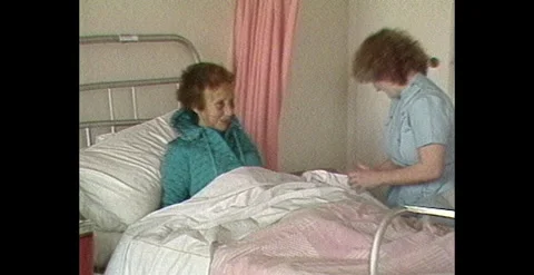 Nurses and Doctors Treating Patients in Australian Hospital (1984) Stock Footage 310485063