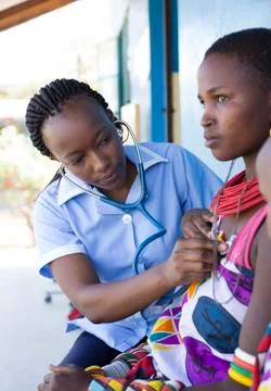 Nurses and Doctors working in busy clinic, Kenya, Africa. Stock Photos