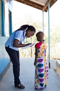 Nurses and Doctors working in busy clinic, Kenya, Africa. Stock Photos