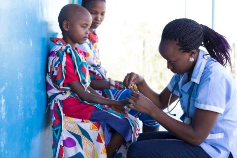 Nurses and Doctors working in busy clinic, Kenya, Africa. Stock Photos