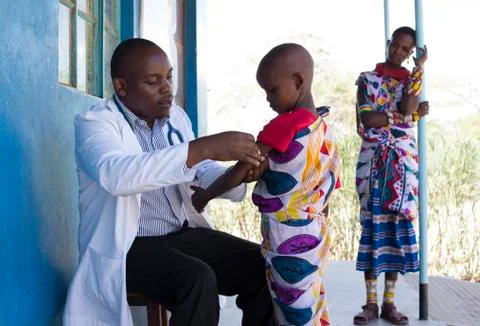 Nurses and Doctors working in busy clinic, Kenya, Africa. Stock Photos