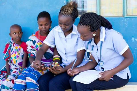 Nurses and Doctors working in busy clinic, Kenya, Africa. Stock Photos