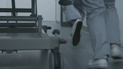 Nurses and paramedics run and push gurney Video stock 250290939