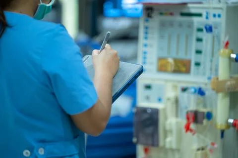 Nurses are checking the function of the hemodialysis machine before use in pa Stock Photos