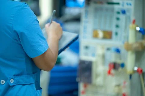 Nurses are checking the function of the hemodialysis machine before use in pa Stock Photos