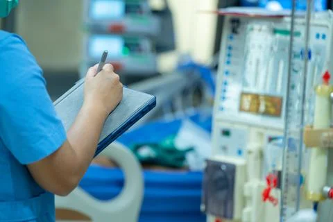 Nurses are checking the function of the hemodialysis machine before use in pa Stock Photos