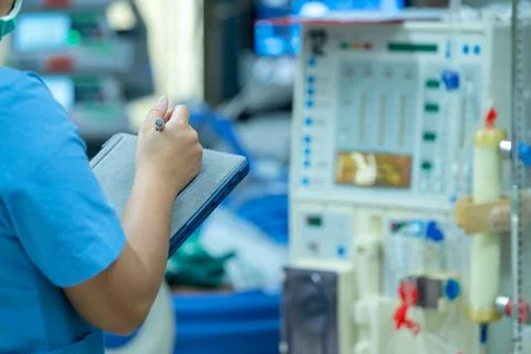 Nurses are checking the function of the hemodialysis machine before use in pa Stock Photos