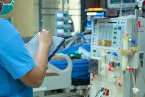 Nurses are checking the function of the hemodialysis machine before use in pa Stock Photos