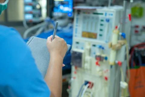 Nurses are checking the function of the hemodialysis machine before use in pa Stock Photos