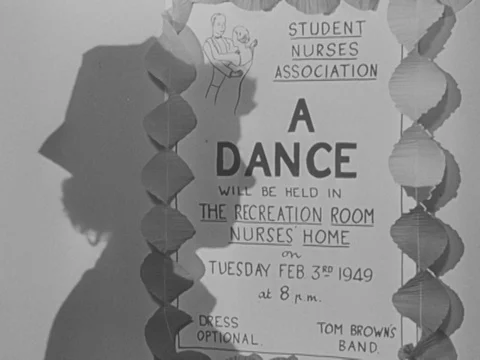 Nurses dancing with men in recreation room, while music is playing, UK 1951 Vídeo Stock 134030685