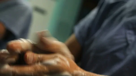 Nurses scrubbing in Stock Footage 32845597