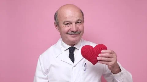 Nurses use hands to show heart shape concept. Stock Photos