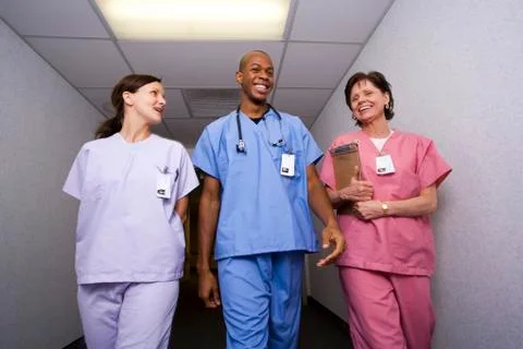Nurses walking and talking Foto stock