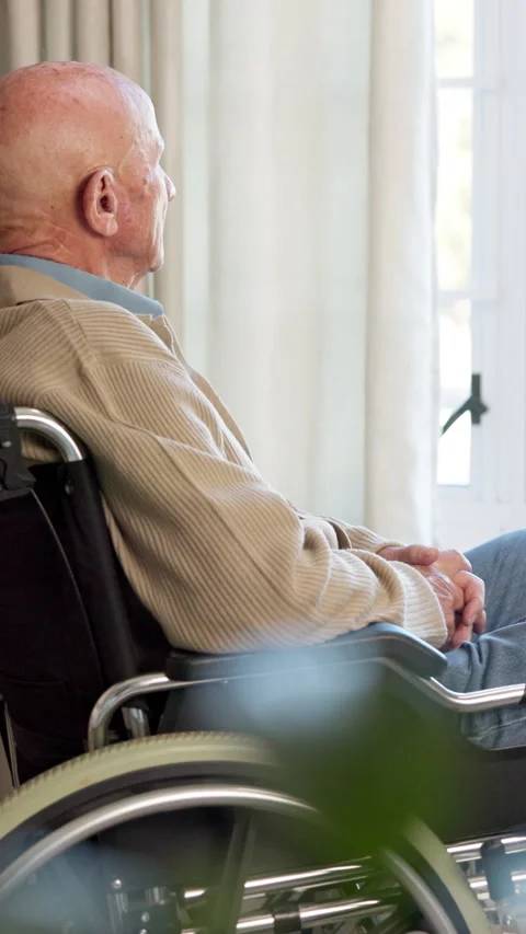 Nursing home, decision and old man in wheelchair, retirement and contemplating Stock Footage 340964189