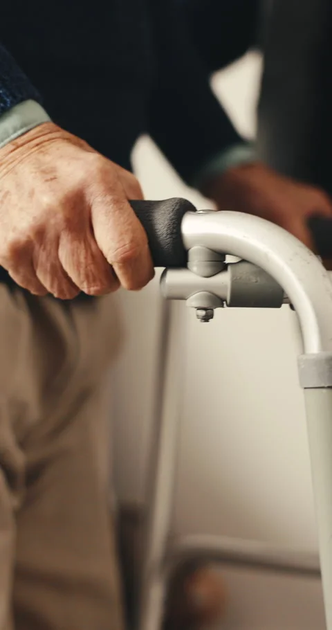 Nursing home, support and hands with walker, retirement and senior patient with Video stock 342254526