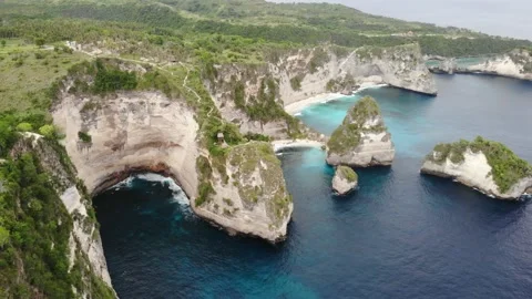 Nusa Penida Cliffs, Tree House and Atuh Beach Aerial View Stock Footage 152867869