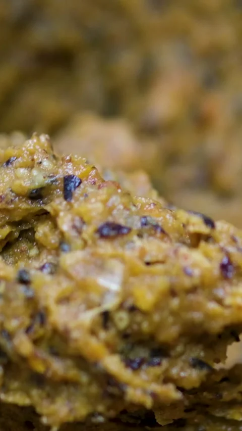 Nut and dried fruit paste Pastry chef filling a large dried date with nut paste Stock Footage 305983224
