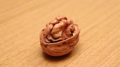 Nut with and without shell rotate Stock Footage 129827390