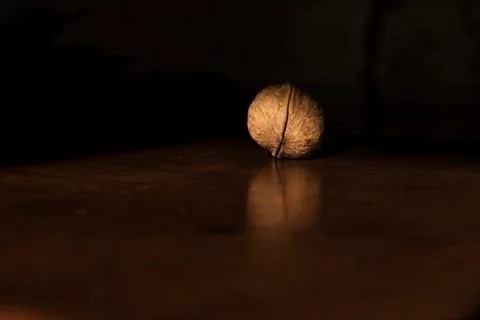 Nut on black Stock Photos