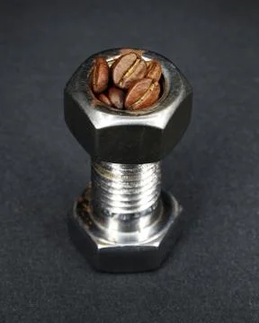 Nut, bolt and coffee beans Stock Photos