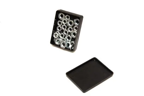 Nut in a box on a white background Stock Photos