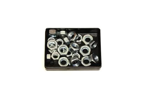 Nut in a box on a white background Stock Photos