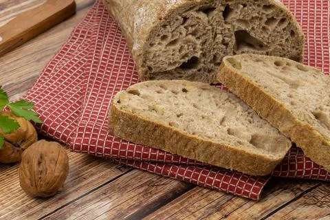 Nut bread cut on a wooden background Stock Photos