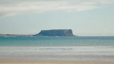 The Nut with coastal beach shallows in foreground Stock Footage 308162956
