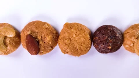 Nut cookies on white background, rotating Stock Footage 303251344