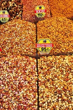 Nut counter in the oriental bazaar. Different varieties of nuts. Stock Photos