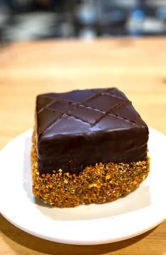 Nut covered chocolate cake Stock Photos