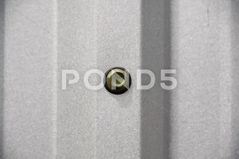 Nut with metal sheet Stock Photos