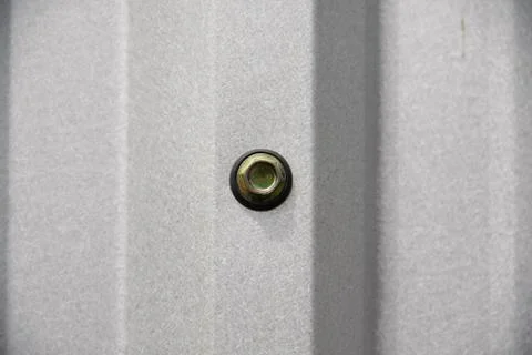 Nut with metal sheet Stock Photos