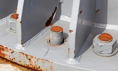 A nut is missing on a screw for metal columns Stock Photos