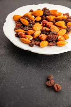Nut mix assorted nuts almonds, raisins, hazelnuts healthy eating nutritious.. Stock Photos