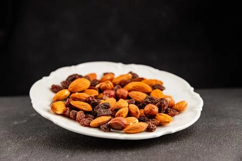 Nut mix assorted nuts almonds, raisins, hazelnuts healthy eating nutritious.. Stock Photos