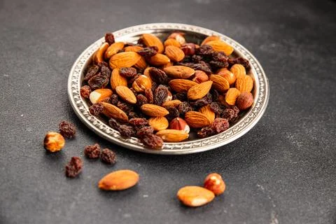 Nut mix assorted nuts almonds, raisins, hazelnuts healthy eating nutritious.. Stock Photos