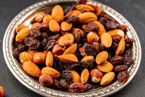 Nut mix assorted nuts almonds, raisins, hazelnuts healthy eating nutritious.. Stock Photos