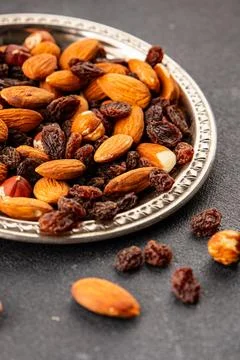 Nut mix assorted nuts almonds, raisins, hazelnuts healthy eating nutritious.. Stock Photos