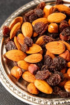 Nut mix assorted nuts almonds, raisins, hazelnuts healthy eating nutritious.. Stock Photos