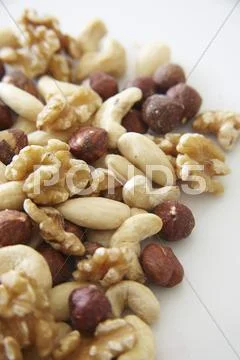 A Nut Mixture On A White Surface