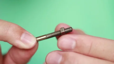 Nut over the bolt closeup 스톡 동영상 75629059