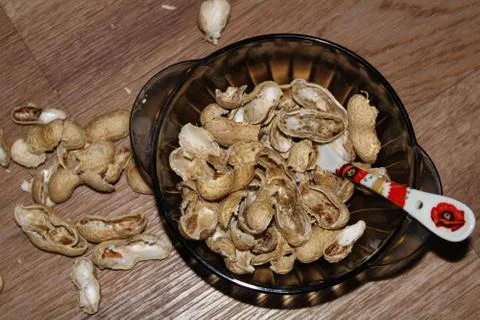 Nut shells in a bowl Stock Photos