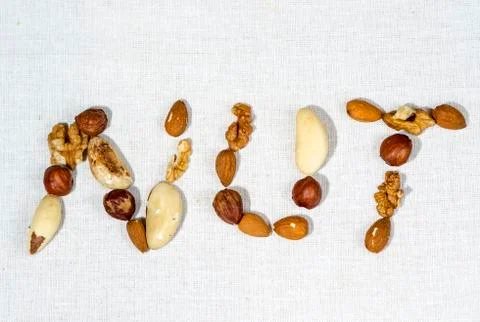 Nut Sign Made Of Nuts Фото