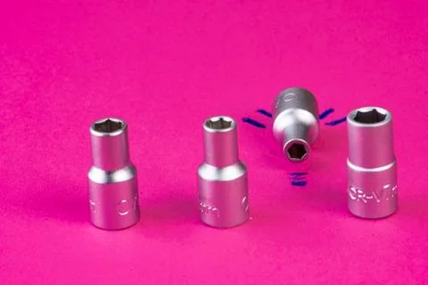Nut socket idea on pink Stock Photos