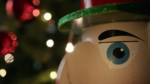 Nutcracker against the Christmas tree Video stock 254473208