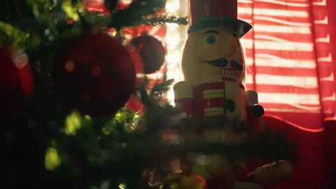 Nutcracker and Christmas tree at early morning in the hotel room Video stock 254855970