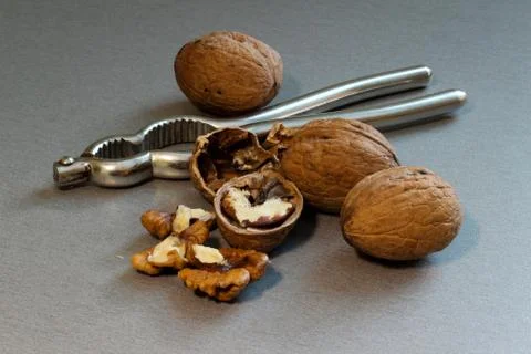Nutcracker and walnuts Stock Photos